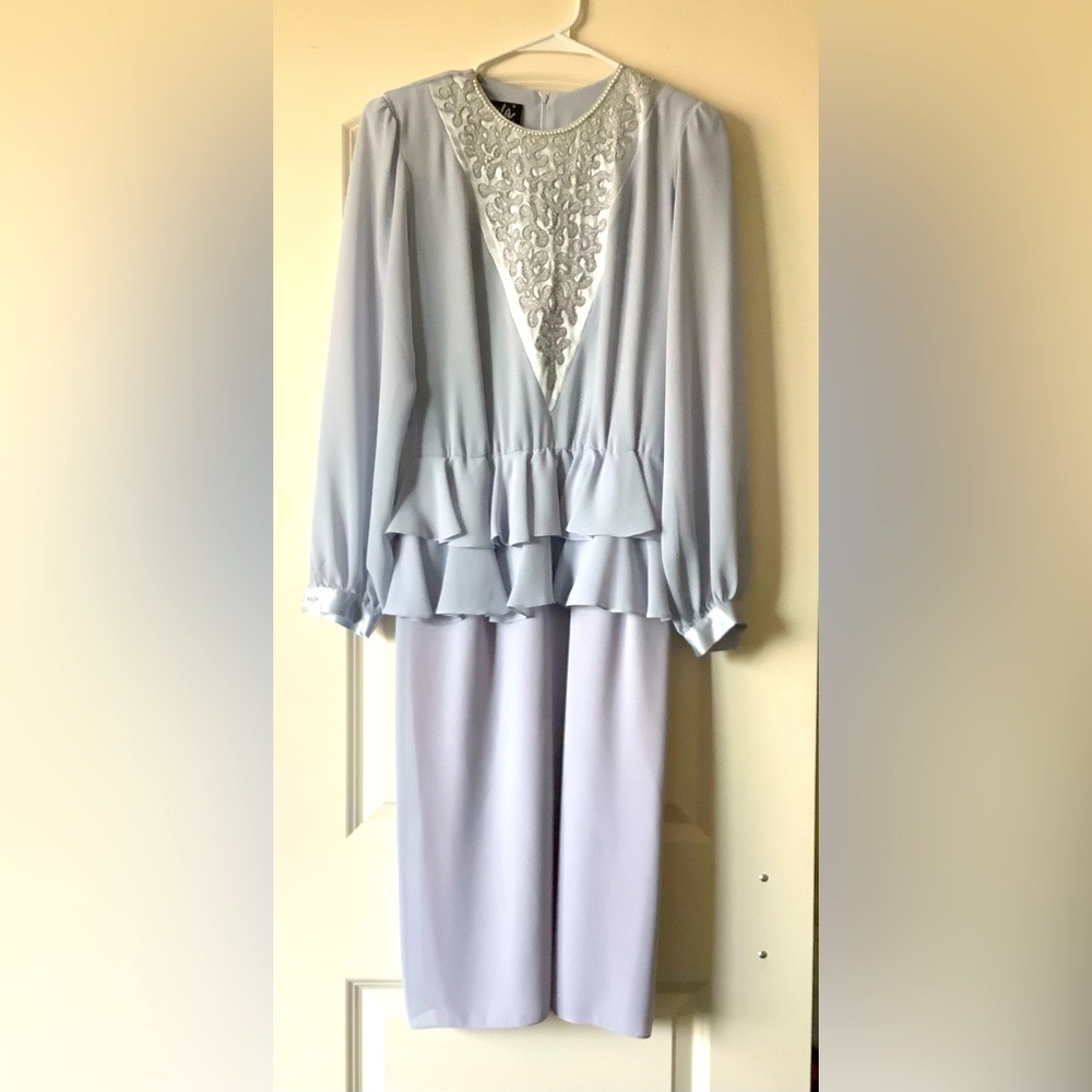 Women’s vintage dress suit.